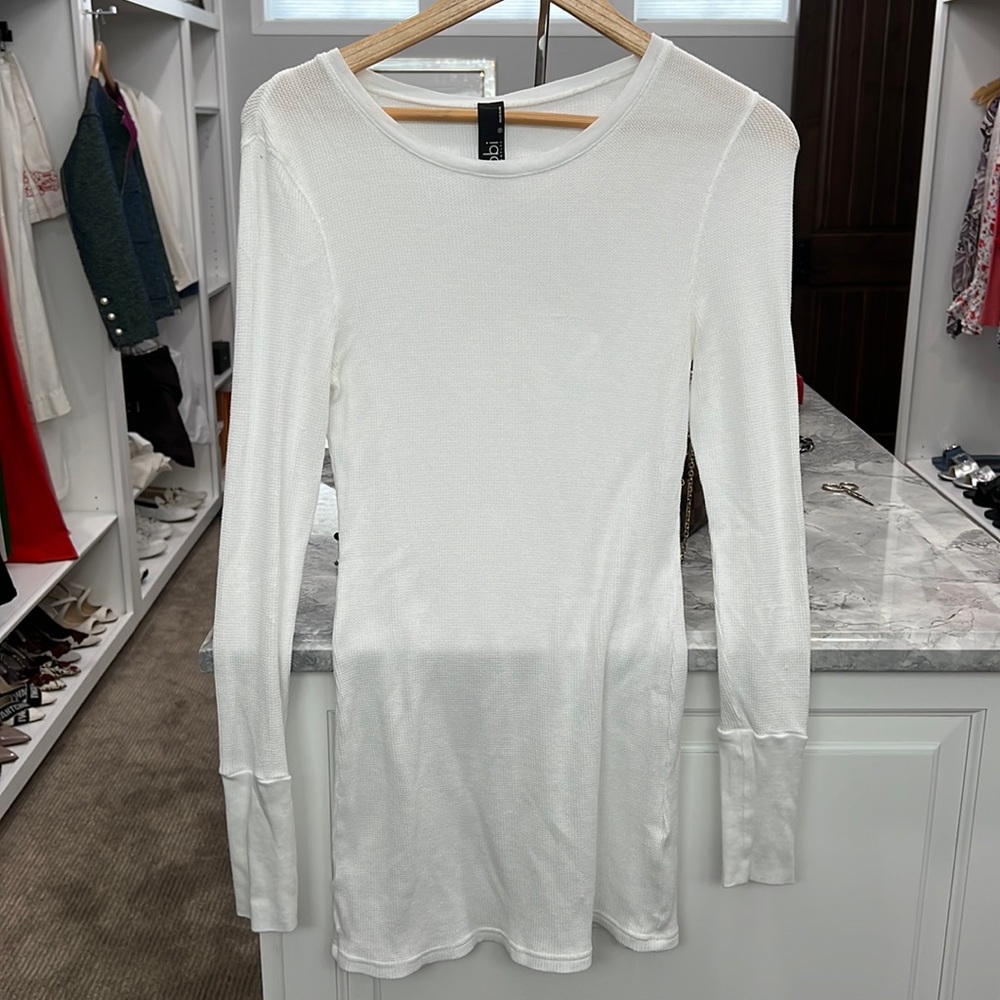 Not worn just washed it. Long white ribbed shirt